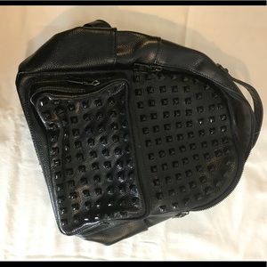 studded black pleather backpack